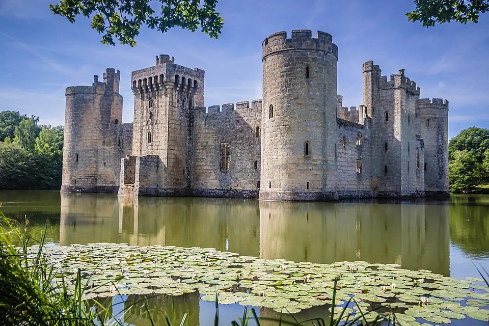 A quadrangular castle and its landscaped setting, an associated millpond, medieval crofts and cultivation earthworks, and a World War II pillbox at Bodiam
