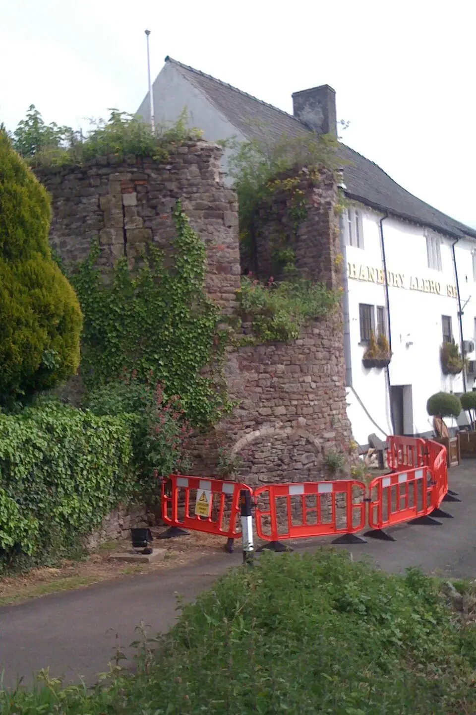 Tower to the south west of, and attached to, The Hanbury Arms